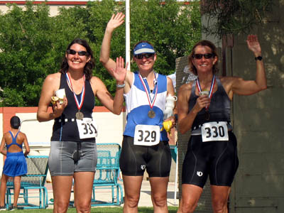 Participants wave after sinishing their first tri